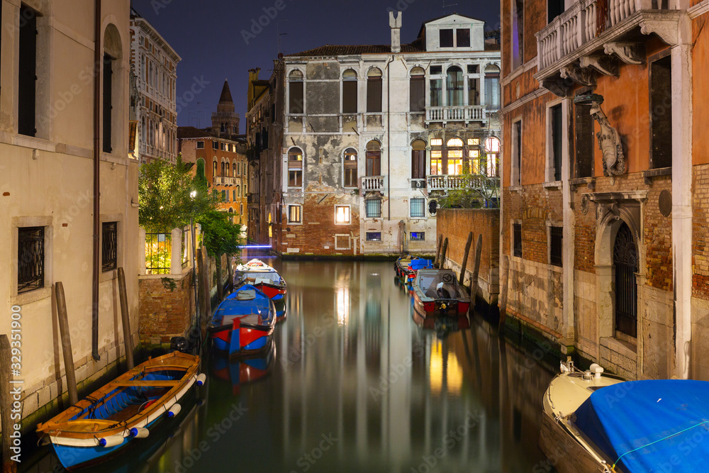 Canals of Venice city with beautiful architecture at night, Italy