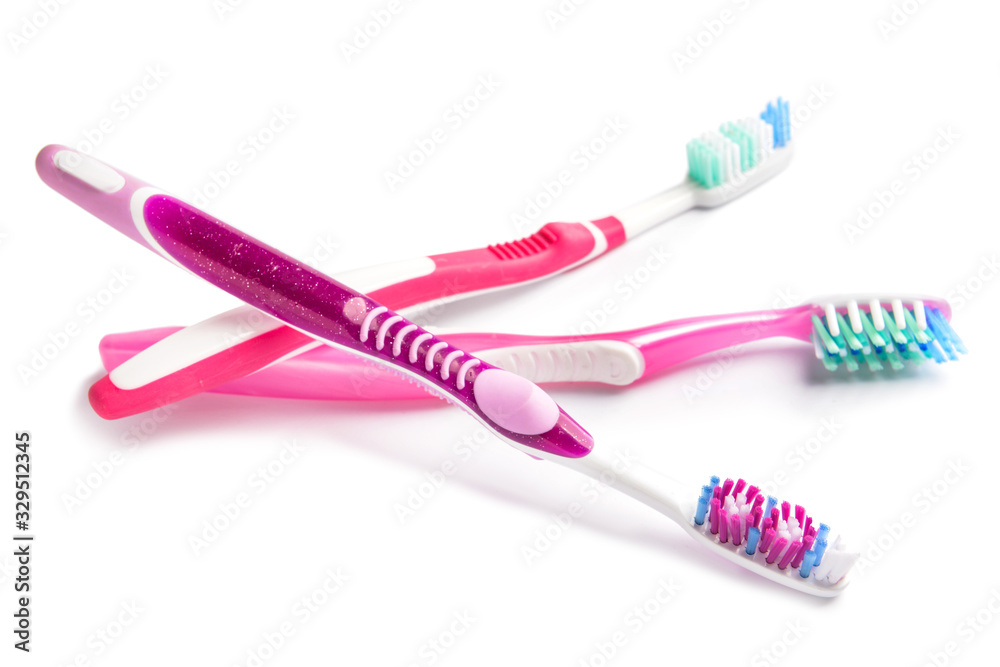 Tooth brushes on white background