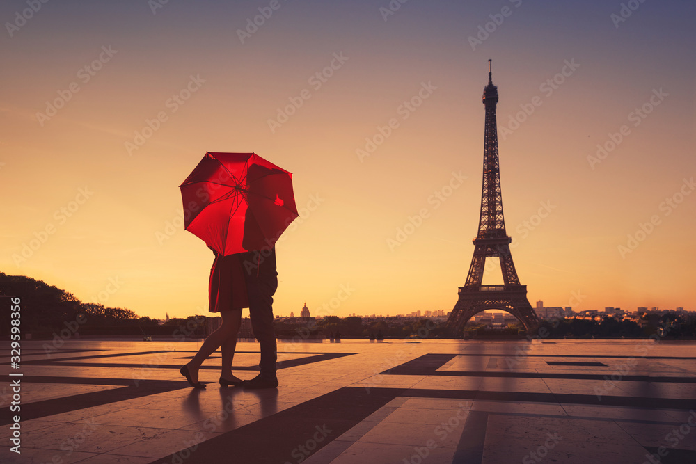 couple travel to Paris, silhouette of lovers kissing near Eiffel tower, romantic escape destination 