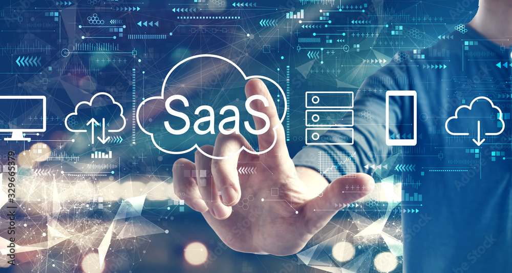 SaaS - software as a service concept with a man on blurred city background