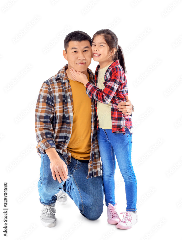 Happy Asian man and his little daughter on white background