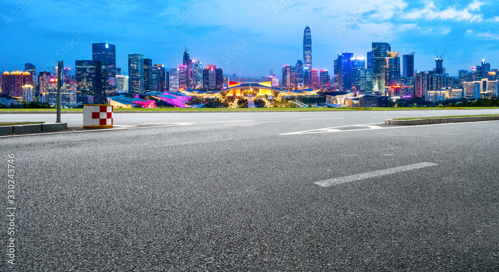 Road and skyline of urban architecture..