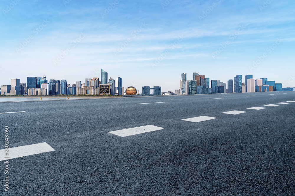 Road and skyline of urban architecture