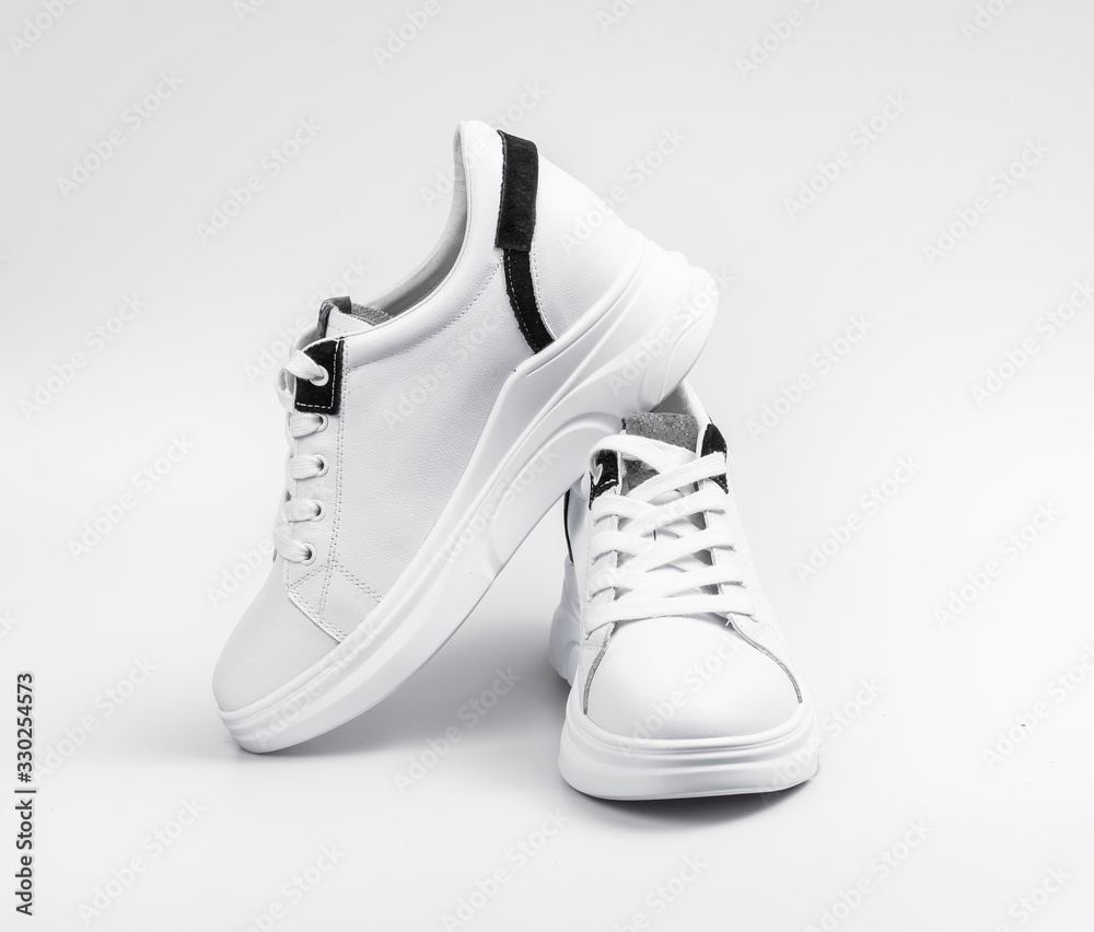 White sneakers isolated on white background