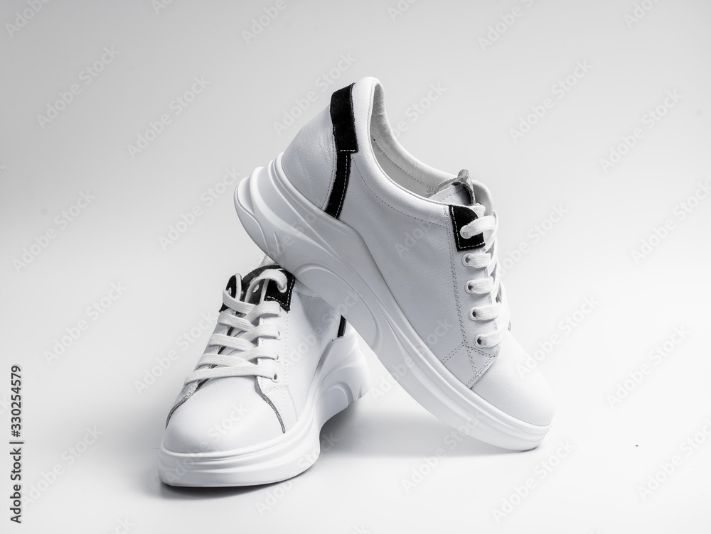 New unbranded running shoe, sneaker or trainer isolated on white background