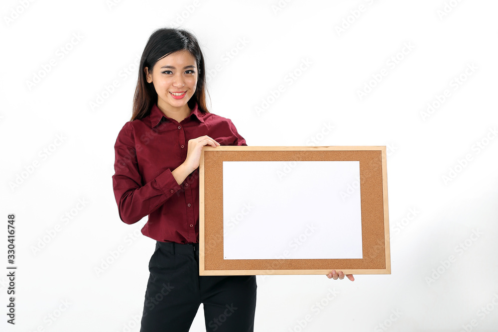 Young attractive Asian woman holding blank writing board text copy space on white background