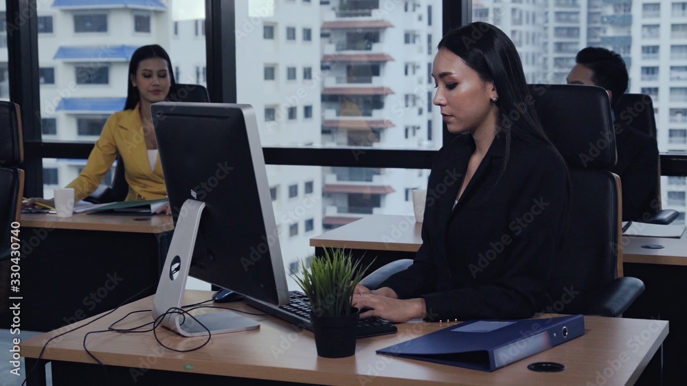 Business people working with desktop computer in office. Workplace community concept.