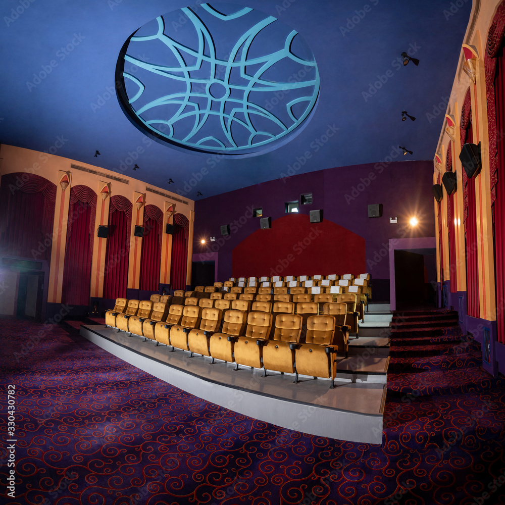 Large cinema theater interior with seat rows for audience to sit in movie theater premiere by cinema