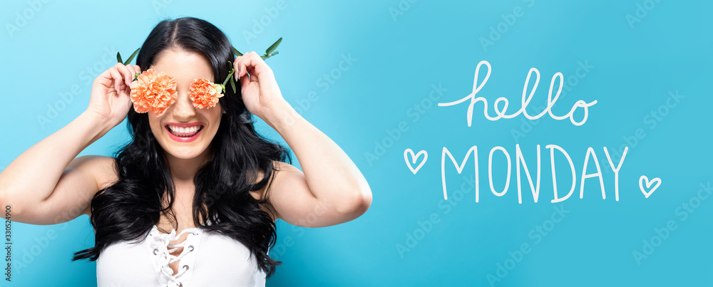 Hello Monday message with young woman holding carnation flowers