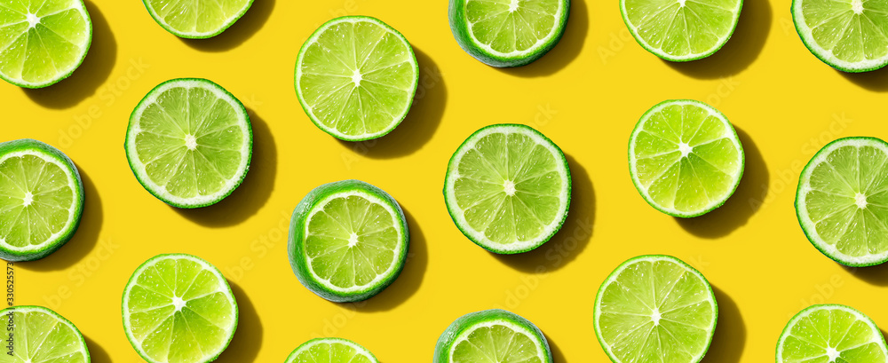 Fresh green limes overhead view - flat lay