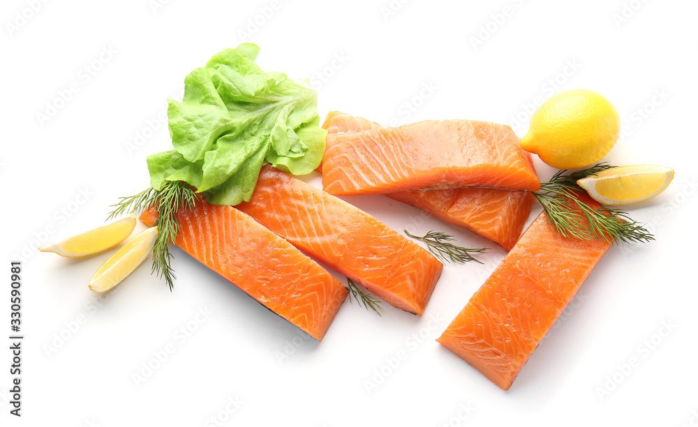 Raw salmon fillet with herbs and lemon on white background