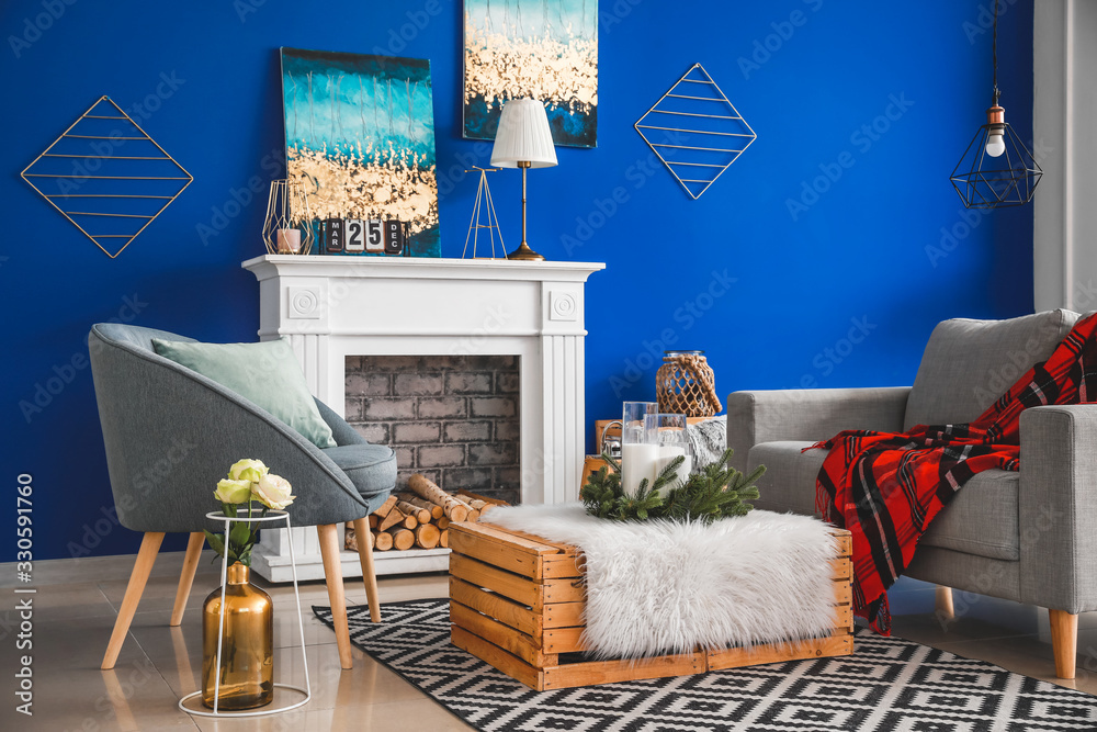 Interior of modern living room with blue wall