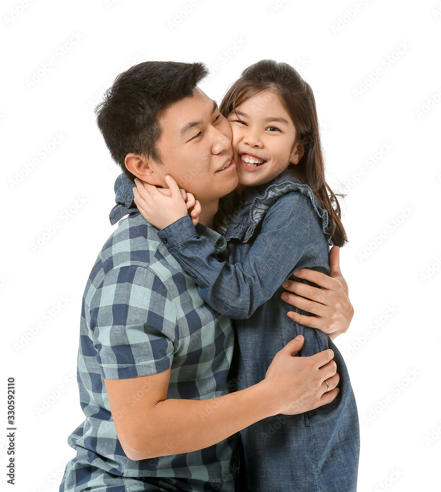 Happy Asian man and his little daughter on white background