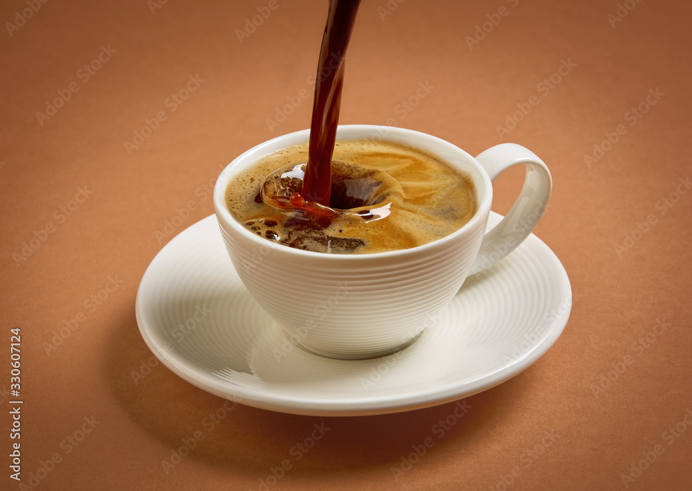 cup of pouring coffee