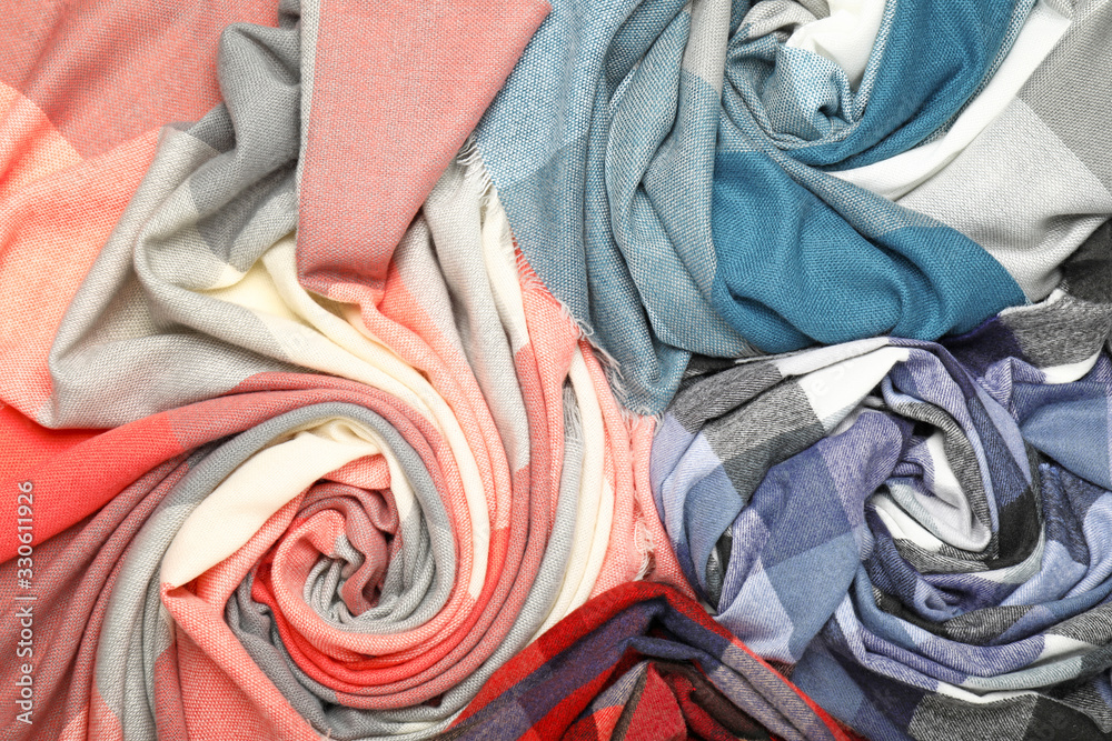 Beautiful scarves as background, closeup