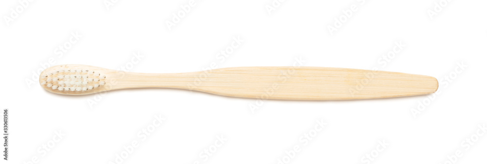 Wooden tooth brush on white background