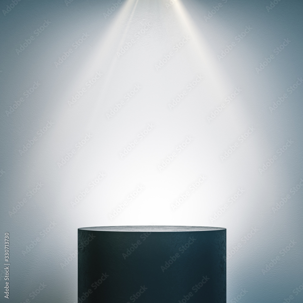 Empty illuminated pedestal in interior with copy space.