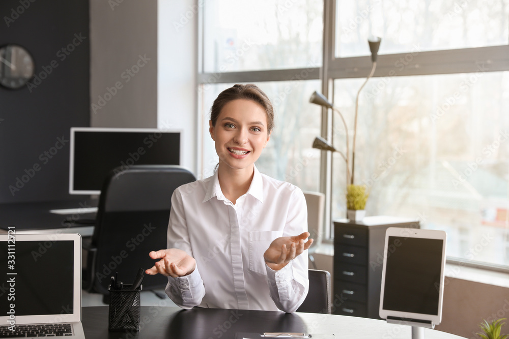 Young woman during job interview in office