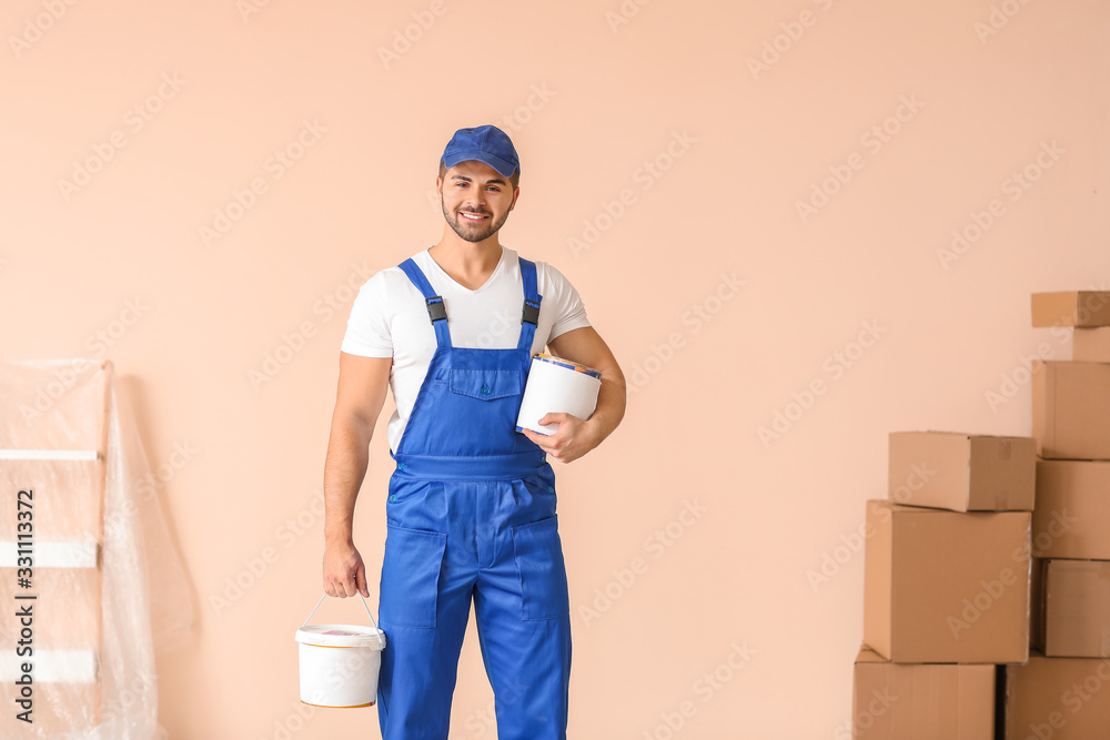 Painter doing repair in room