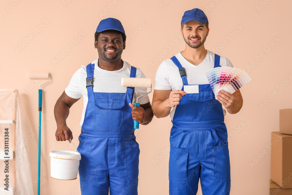 Portrait of painters in room