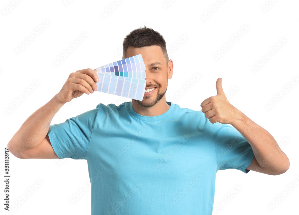 Man with color palettes on white background