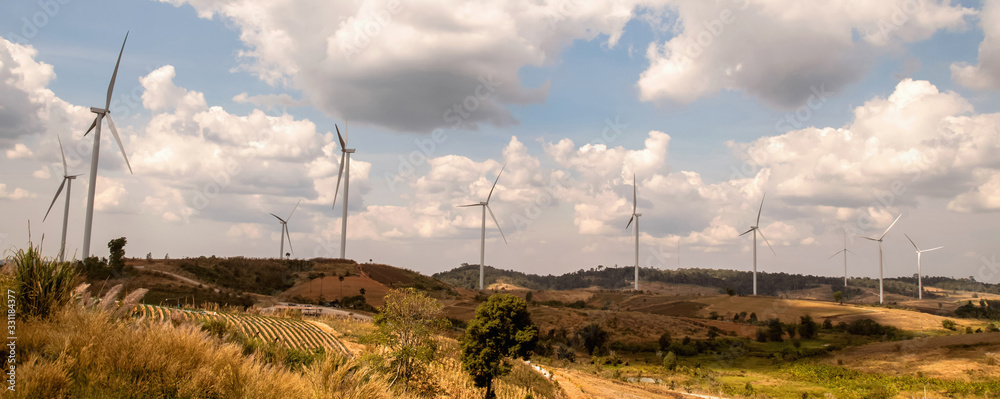 wind turbine on hill. concept clean energy