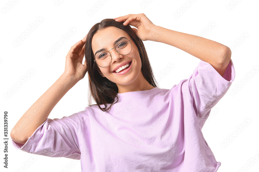 Young woman with stylish eyeglasses on white background