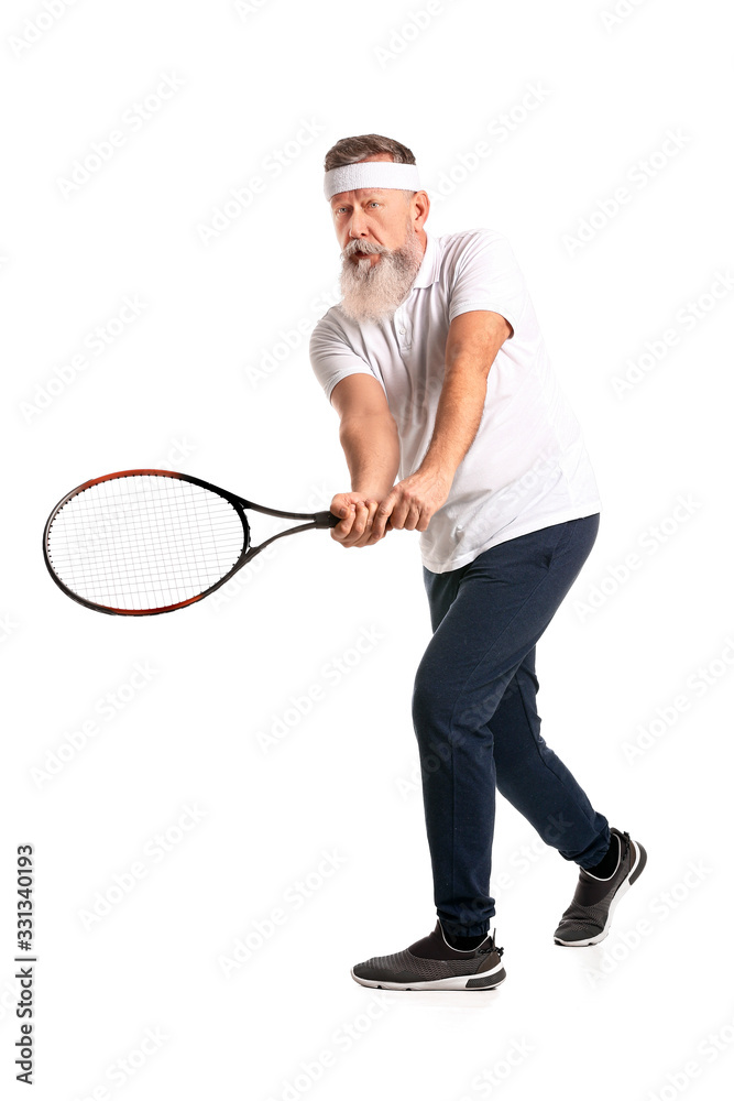 Elderly tennis player on white background