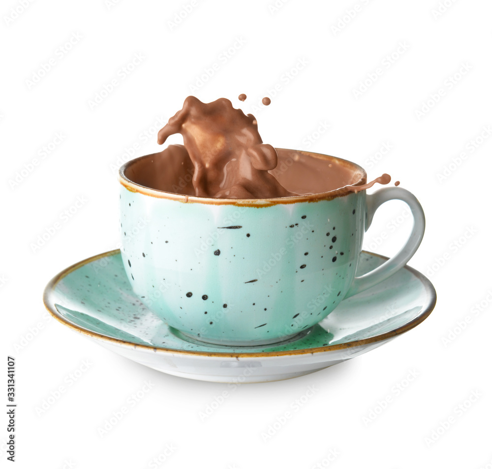 Cup with splashing cocoa drink isolated on white