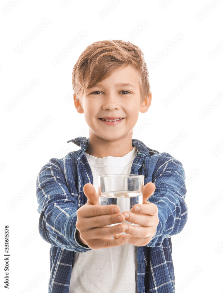 Cute little boy with glass of water on white background