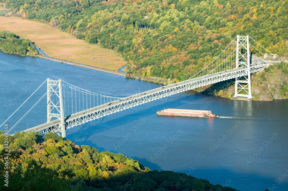 Autumn view overlook of Bear Mountain Bridge, trash barge and Hudson Valley and River at Bear Mounta