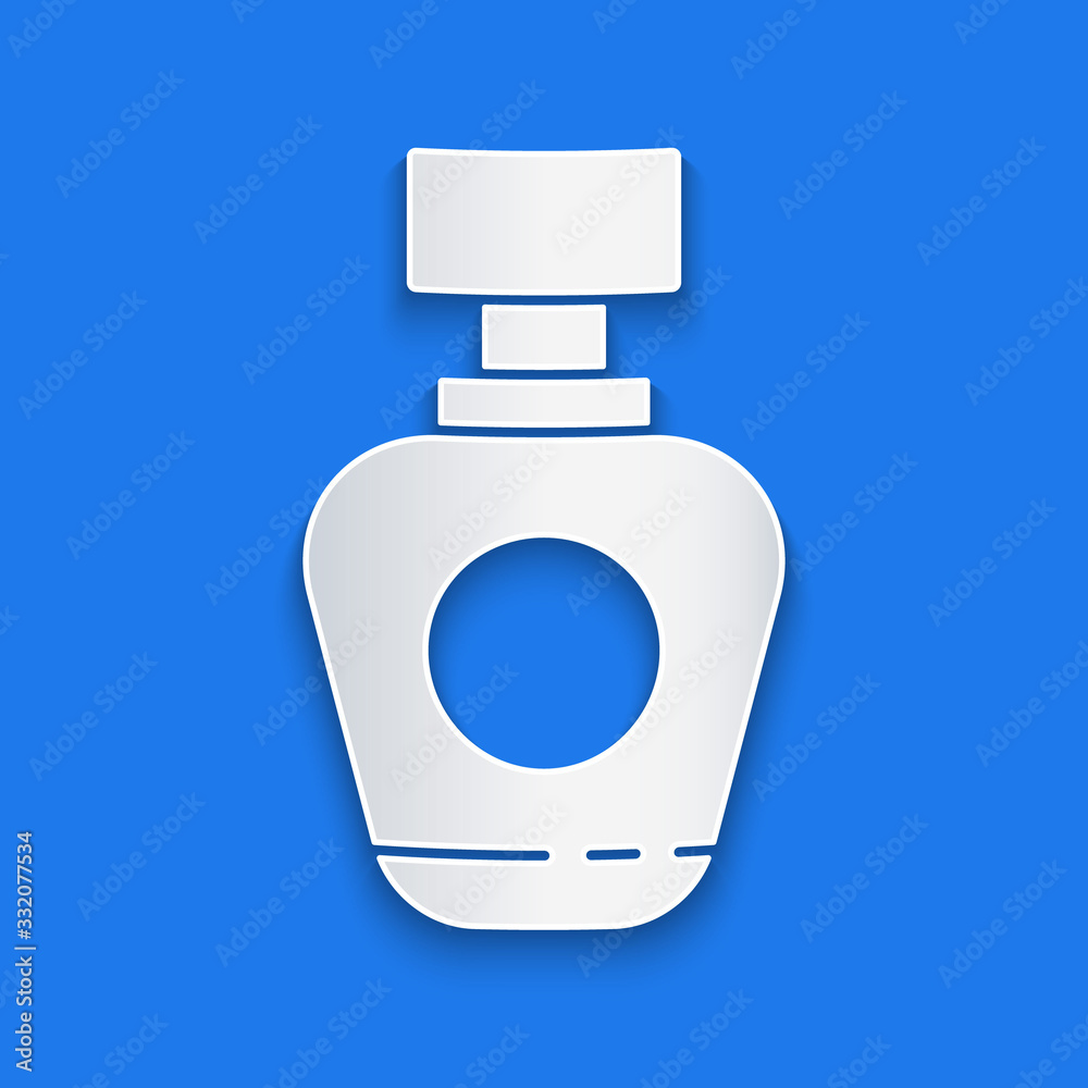 Paper cut Perfume icon isolated on blue background. Paper art style. Vector Illustration