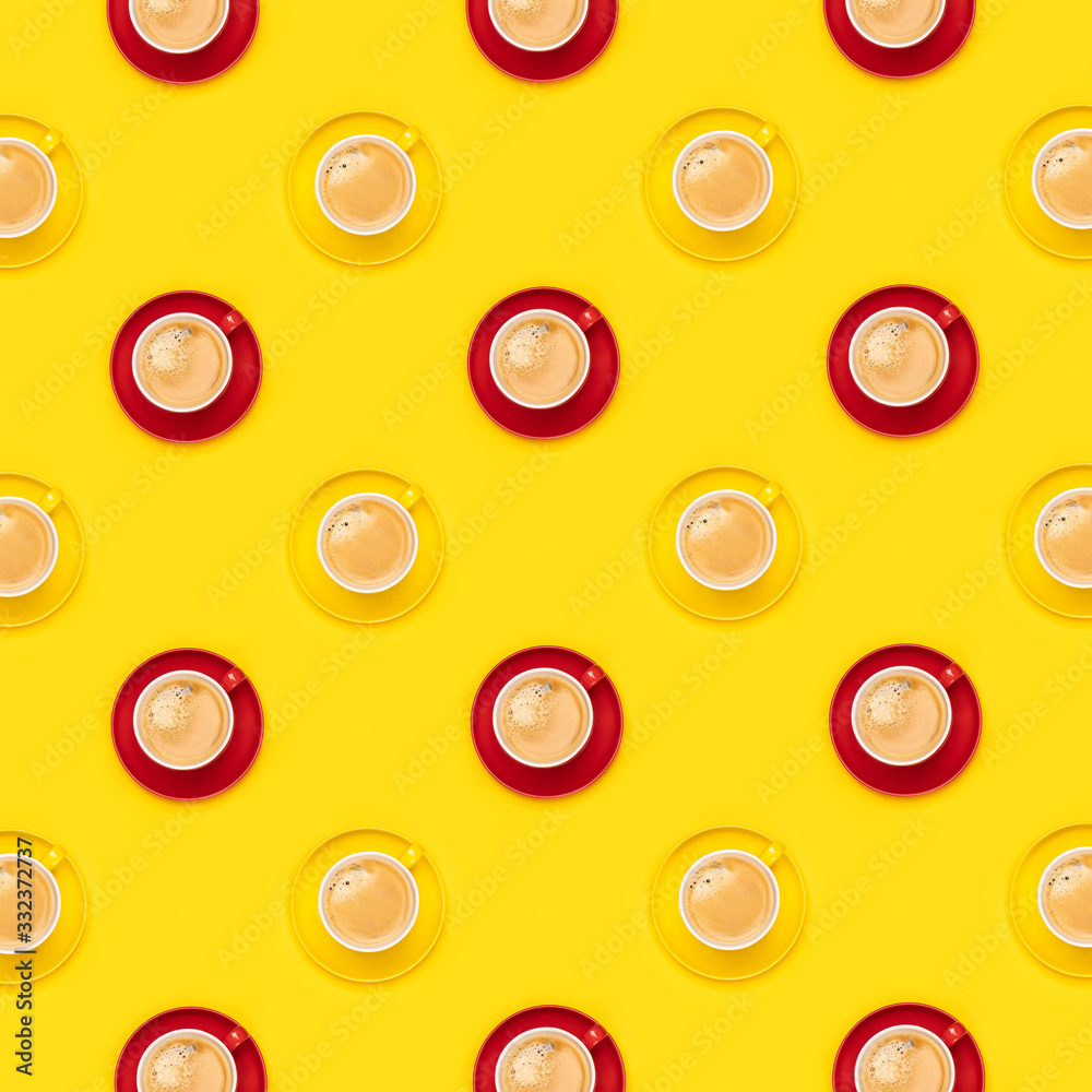 Colorful coffee cups pattern on yellow background