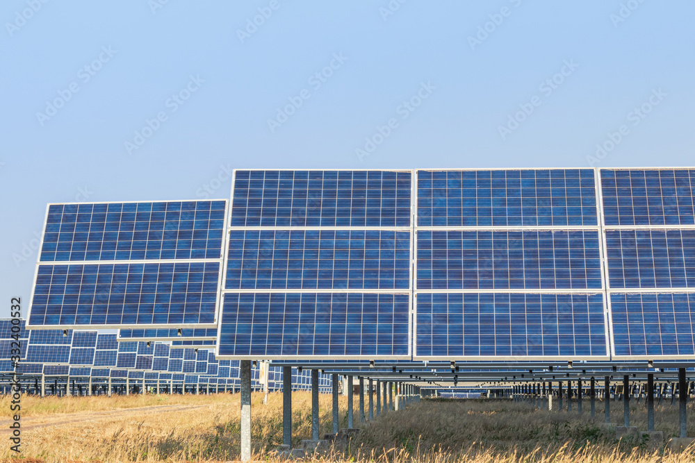 solar cells or photovoltaics in solar power station convert light energy from the sun into electrici