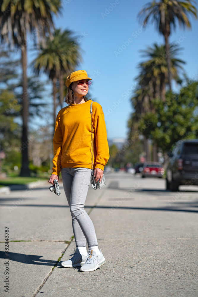 Young tourist with a retro camera in Hollywood