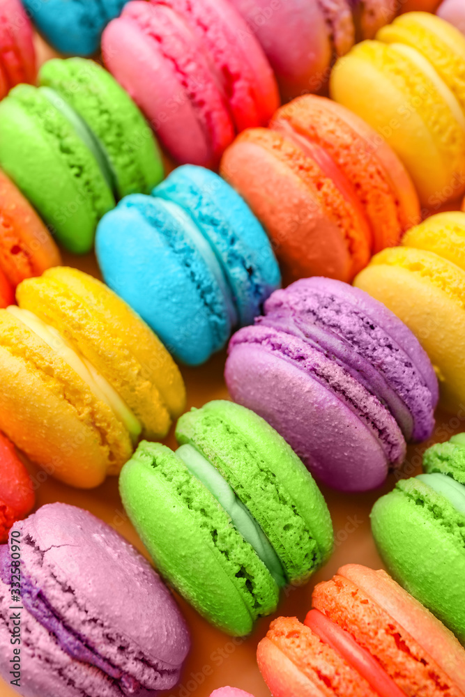 Many tasty macarons as background