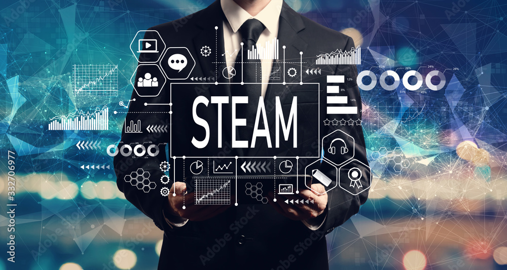 STEAM concept with businessman holding a tablet computer