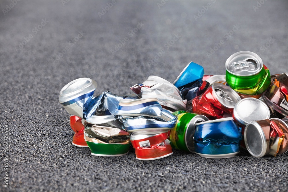 Crushed colored metal beverage cans