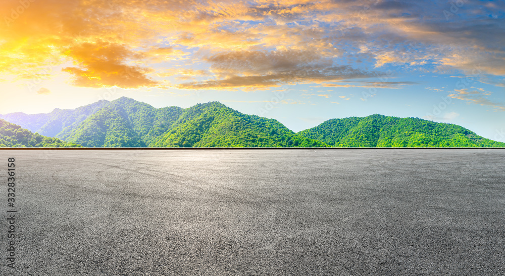 Race track road and green mountain nature landscape at sunset,panoramic view.