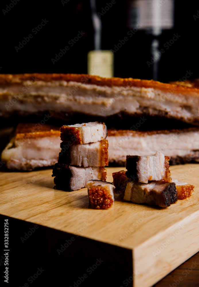 Oriental Roast Pork Belly on wooden chopping board