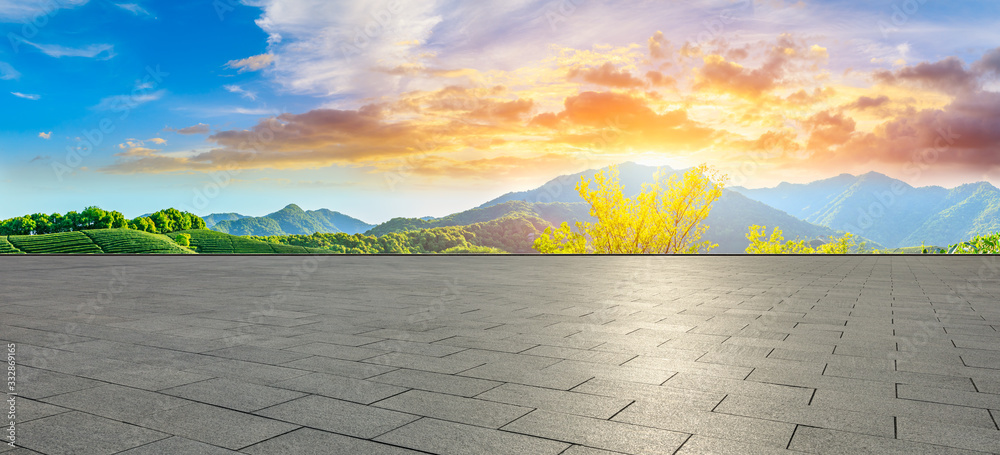 Empty square floor and green tea mountain nature landscape at sunset,panoramic view.