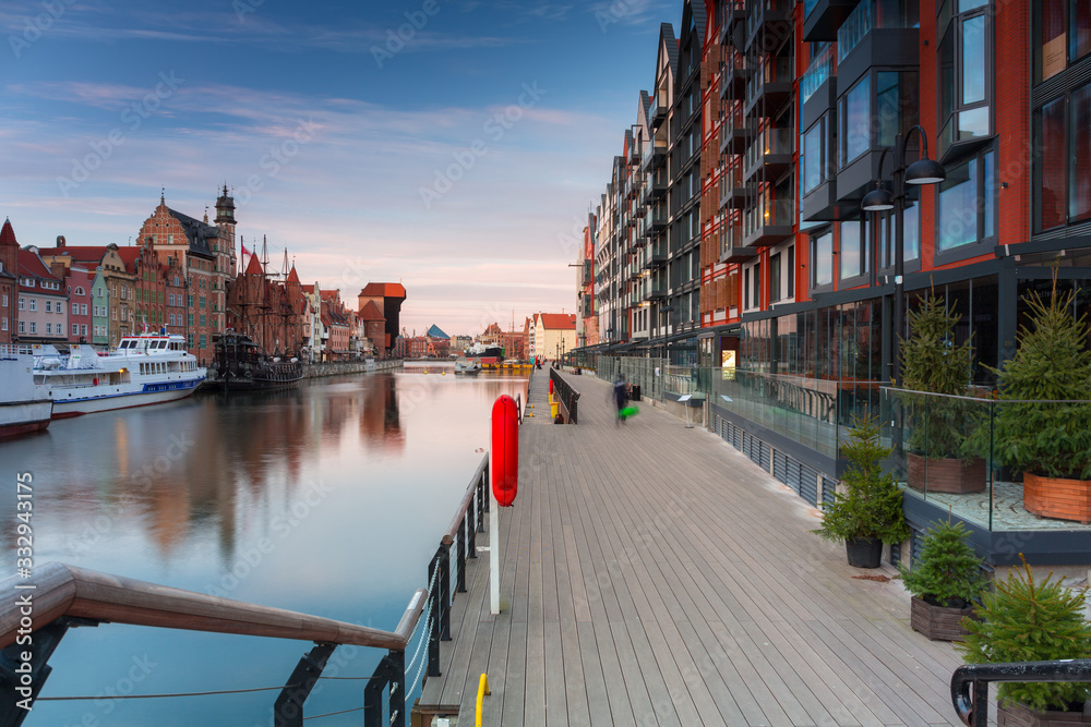 Gdansk with beautiful old town over Motlawa river at sunset, Poland.