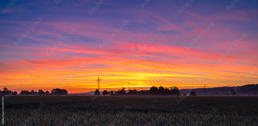 Beautiful cloulds and fields at sunset