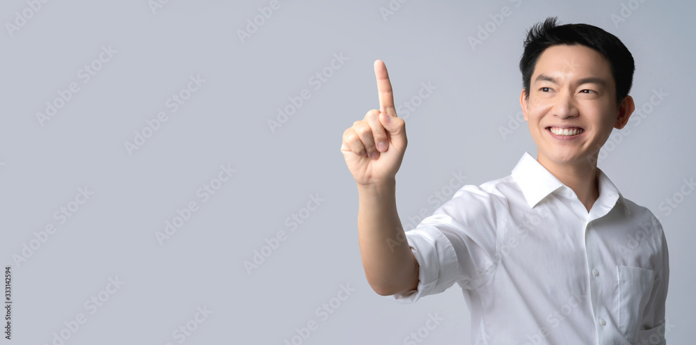 attractive asian male hand gesture present show copy space for your ideas,happiness smile posotive a