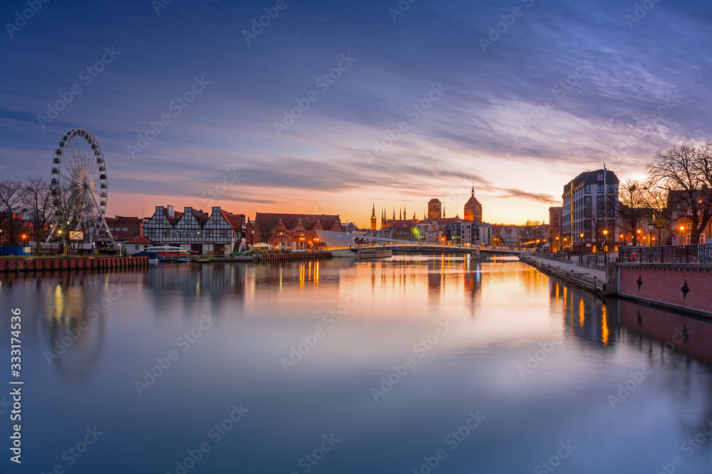 Gdansk with beautiful old town over Motlawa river at sunset, Poland.