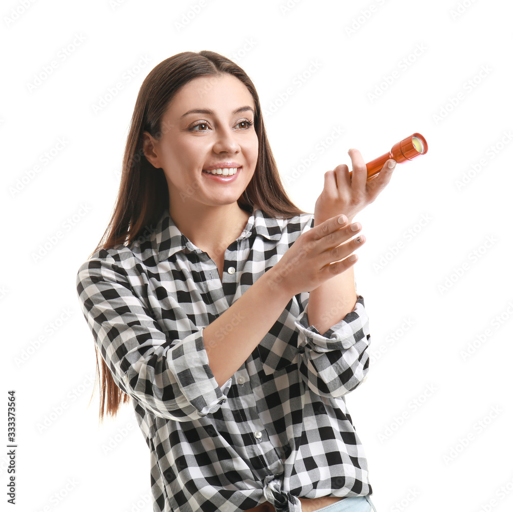 Woman with flashlight on white background