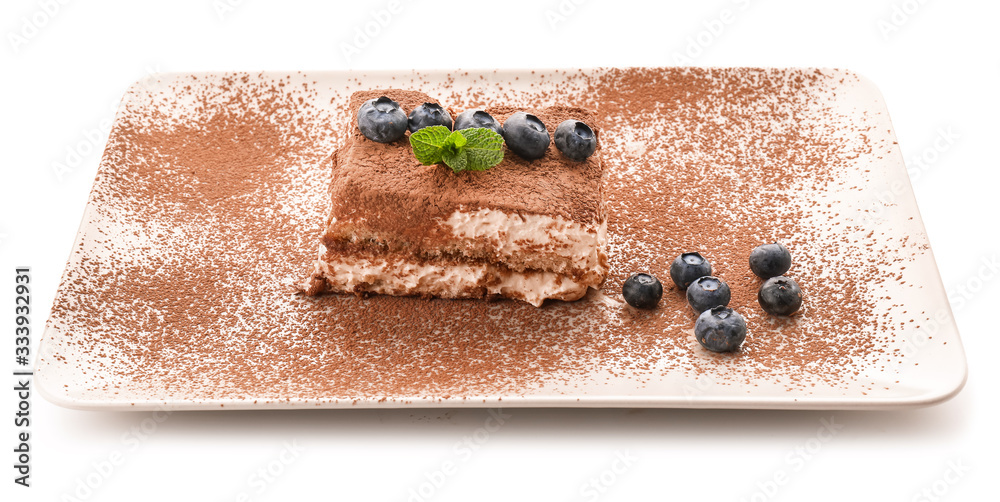 Plate with tasty tiramisu on white background