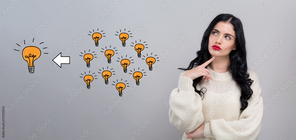 Many small ideas into one big idea with young woman in a thoughtful face