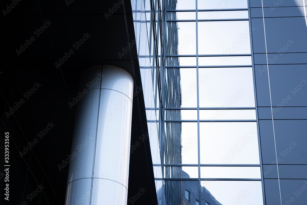 Abstract texture and blue glass facade in modern office building.  