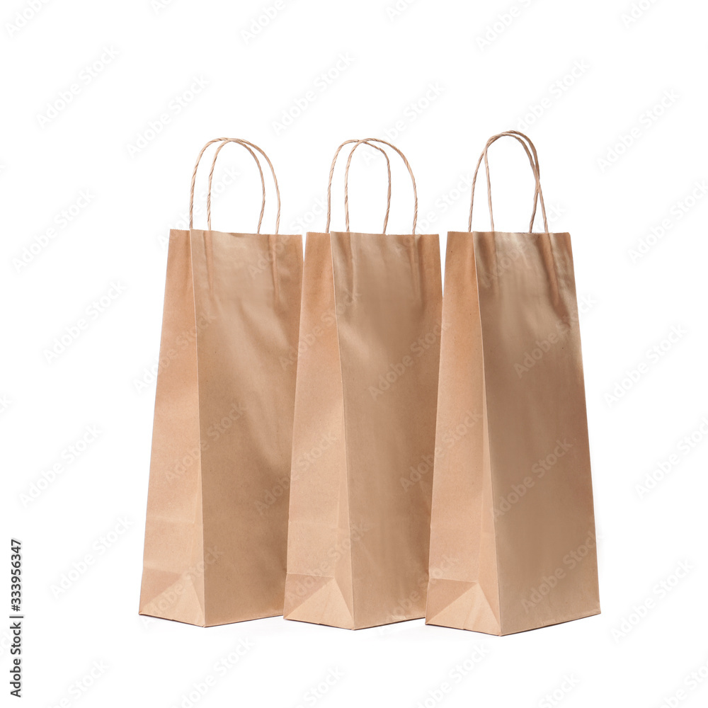 Paper shopping bags on white background